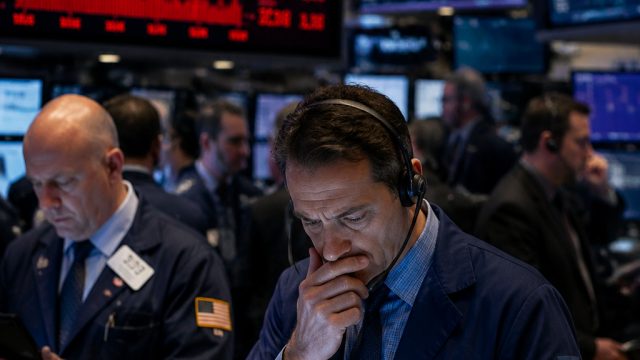 Wall Street Dips Amid Semiconductor Market Uncertainties